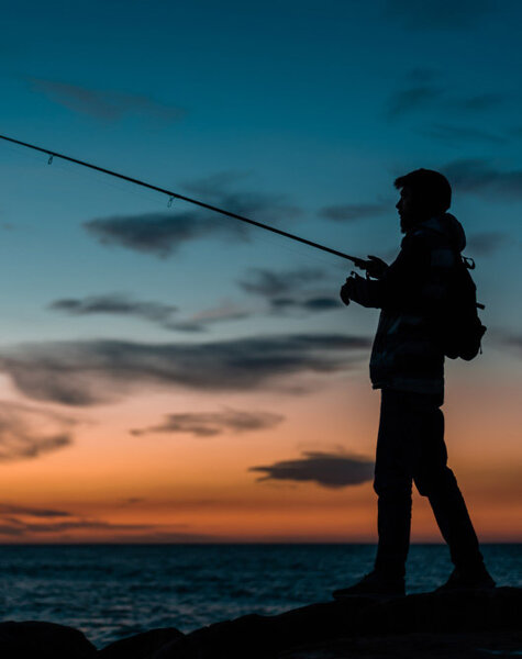 Boy Fishing In Maldives