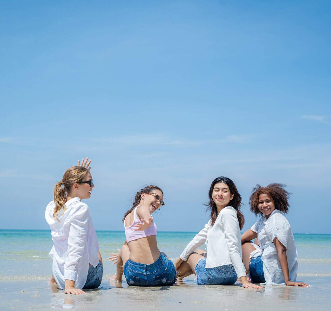 Teens Enjoy In The Beach